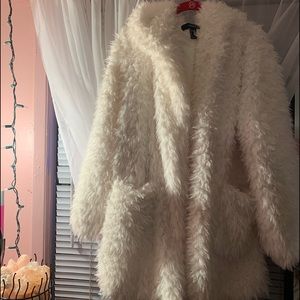 White faux fur coat